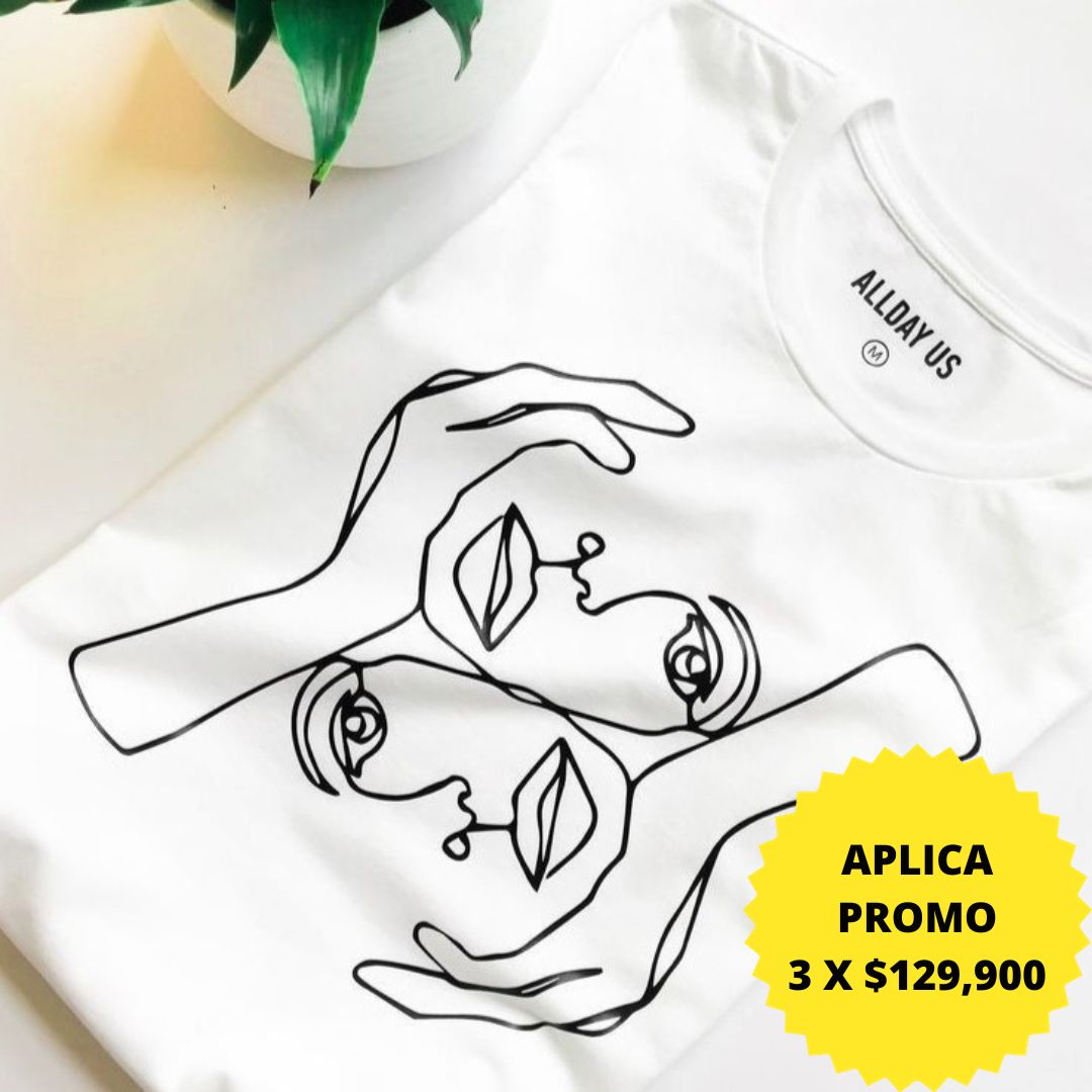 Camiseta blanca con diseño artístico de rostro y manos en promoción especial de 3 por $129,900, ideal para un estilo único y moderno. Disponibilidad en KIKE RODRIGUEZ.