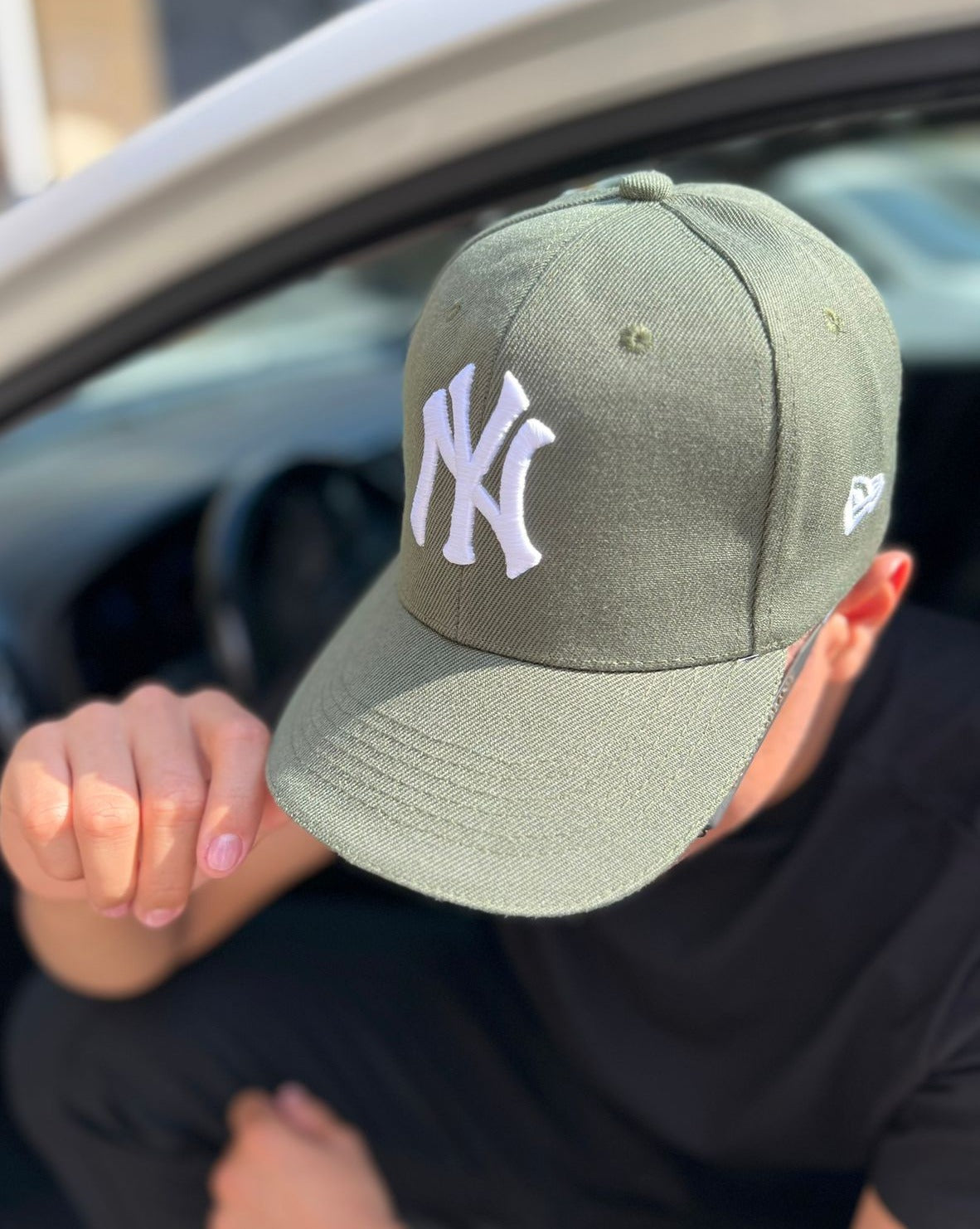NY CAPS UNISEX MILITARY GREEN WHITE LETTERS